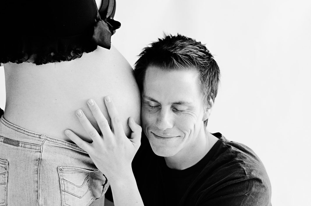 Couple Enjoys the Early Days of Pregnancy